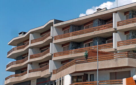 Crans-Montana 320: Sky, Building, Property, Cloud, Window, Condominium, Urban Design, Tower Block, Wood, Neighbourhood