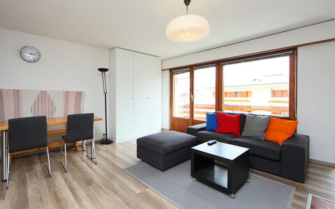 Crans-Montana 320: Room, Furniture, Property, Living Room, Interior Design, Building, Floor, Hardwood, Real Estate, Yellow