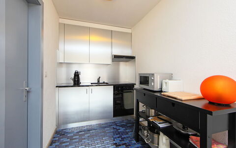 Crans-Montana 320: Room, Property, Yellow, Furniture, Countertop, Floor, Interior Design, Real Estate, Kitchen, Building