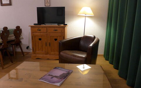 Crans-Montana 353: Furniture, Picture Frame, Building, Comfort, Television, Wood, Interior Design, Living Room, Floor, Flooring