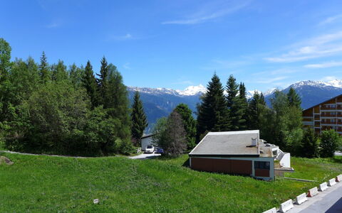 Crans-Montana 450: Sky, Cloud, Plant, Mountain, Building, Tree, Natural Landscape, Highland, Land Lot, Larch