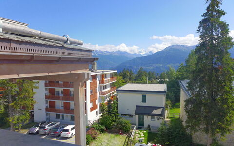 Genziana B 20: Sky, Plant, Property, Daytime, Building, Cloud, Window, Tree, Mountain, Urban Design