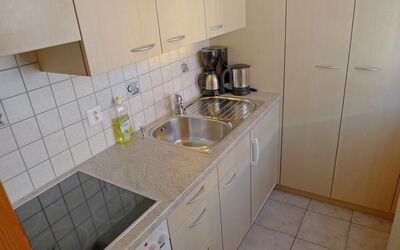 Weisshorn 200.3: Property, Room, Tile, Kitchen, Floor, Furniture, Cabinetry, Countertop, House, Architecture
