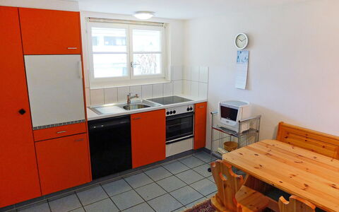 Weggis 7: Room, Property, Furniture, Kitchen, Orange, Building, Floor, House, Interior Design, Cabinetry