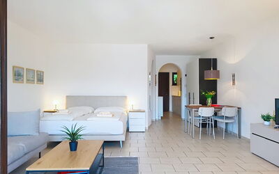 Residenza Miralago Apt. A6 100.20: Furniture, Interior Design, Flooring, Floor, Couch, Ceiling, Table, Lighting, Living Room