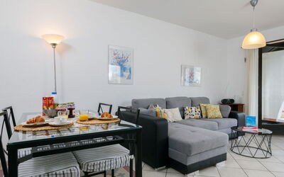 Residenza Miralago Apt. B13 100.24: Table, Furniture, Couch, Picture Frame, Studio Couch, Lamp, Interior Design, Living Room, Floor