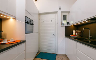 Residenza Miralago Apt. A5 100.42: Cabinetry, Property, Countertop, Building, Sink, Wood, Kitchen, Lighting, Architecture, Interior Design
