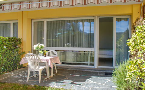 Locarno 410: Plant, Window, Furniture, Building, Chair, Shade, Porch, Yellow, Outdoor Furniture, Wood