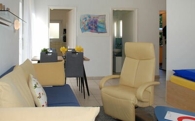 Residenza Lido Appartment 011 410.26: Furniture, Table, Chair, Comfort, Azure, Living Room, Interior Design, Floor, Flooring, Building