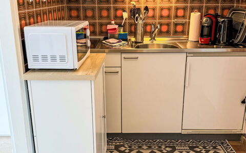 Ascona 100: Flooring, Floor, Wood, Kitchen, Kitchen Appliance, Major Appliance, Interior Design, Tile, Room, Cabinetry