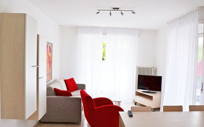 Residenza Corallo 100.22: Room, Furniture, Interior Design, Property, Red, Ceiling, Floor, Product, Living Room, Building