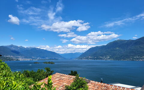 Stellina del Sole: Mountain, Sky, Blue, Mountainous Landforms, Water, Body Of Water, Hill, Mountain Range, Natural Landscape, Coastal And Oceanic Landforms