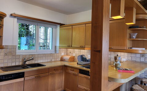 Stellina del Sole: Countertop, Kitchen, Cabinetry, Furniture, Flooring, Wood, Interior Design, Kitchen Appliance, Ceiling, Light Fixture