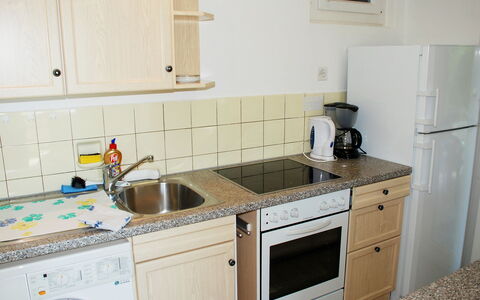 Christa: Countertop, Kitchen, Room, Property, Cabinetry, Furniture, Sink, Major Appliance, Kitchen Sink, Tile