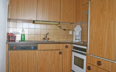 Bellavista Erika 19: Cabinetry, Room, Kitchen, Furniture, Property, Countertop, Cupboard, Plywood, Major Appliance, Wood