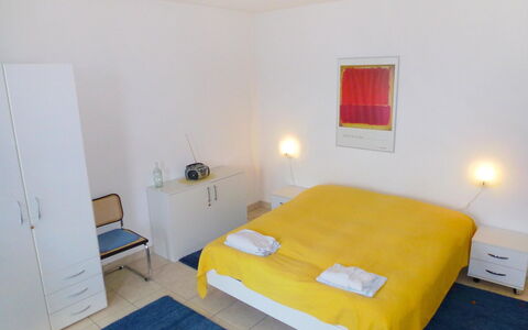 Aldesago 102: Bedroom, Room, Bed, Furniture, Property, Bed Sheet, Floor, Yellow, Bed Frame, Bedding