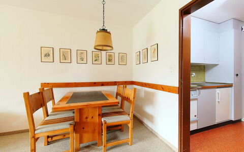 Davos 200: Room, Furniture, Property, Interior Design, Orange, Table, Building, Dining Room, Floor, Ceiling