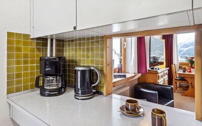 Guardaval Apt 301 200.3: Property, Building, Table, Lighting, Countertop, Window, Kitchen, Interior Design, Wood, Kitchen Appliance