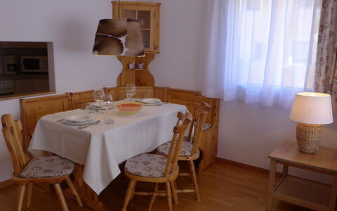 St. Moritz 116: Room, Furniture, Dining Room, Tablecloth, Table, Property, Interior Design, Chair, Floor, Hardwood