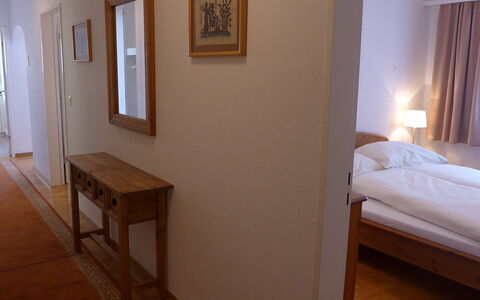 St. Moritz 116: Room, Furniture, Property, Floor, Wall, Bed, Hardwood, Building, Wood Flooring, Interior Design