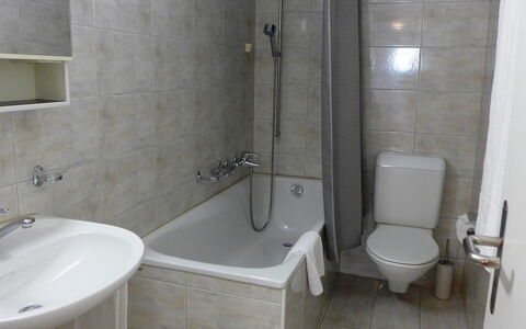 St. Moritz 116: Bathroom, Property, Plumbing Fixture, Room, Toilet, Tile, Toilet Seat, Tap, Wall, Architecture
