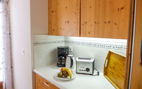St. Moritz 456: Room, Property, Yellow, Furniture, Kitchen, Countertop, Shelf, Cabinetry, House, Wood