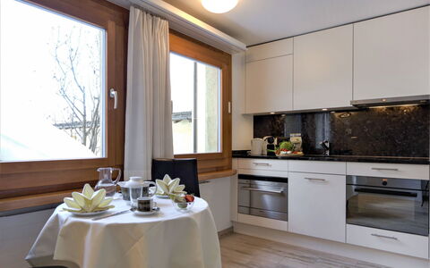 Chesa Munteratsch 311: Furniture, Cabinetry, Property, Countertop, Table, Window, Interior Design, Building, Lighting, Wood