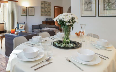 Chesa Prasüra 10: Furniture, Interior Design, Tableware, Table, Dining Room, Kitchen & Dining Room Table, Chair, Textile, Room, Lighting