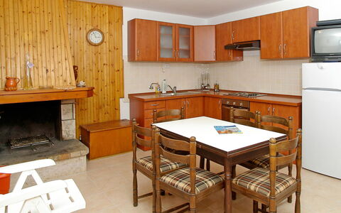 Korčula Vela Luka 800: Room, Furniture, Property, Building, Kitchen, Interior Design, House, Cabinetry, Floor, Table