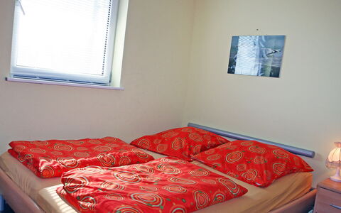 Goetheallee: Bedroom, Bed, Furniture, Bed Sheet, Room, Bedding, Mattress, Property, Bed Frame, Red