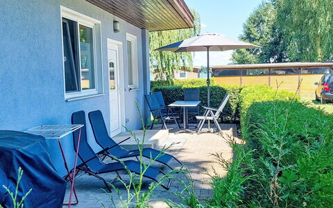 Goetheallee: Furniture, Shrub, Outdoor Furniture, Chair, Shade, Garden, Outdoor Table, Cottage, Lawn, Yard