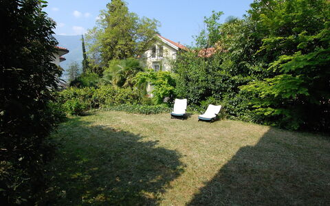 Villa Esperia: Tree, Property, Grass, Natural Landscape, Garden, Biome, Shrub, Land Lot, House, Yard
