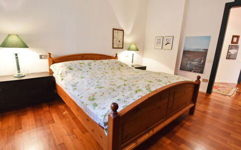 Villa Esperia: Bedroom, Furniture, Bed, Room, Property, Bed Frame, Bed Sheet, Floor, Wood Flooring, Interior Design