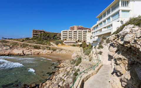 Salou 350: Water, Building, Sky, Plant, Azure, Window, Tree, Coastal And Oceanic Landforms, Beach, Terrain