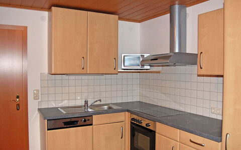 Krechen Alm: Property, Cabinetry, Room, Kitchen, Countertop, Furniture, Orange, Interior Design, House, Building