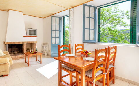 La Rectoria Ii: Table, Furniture, Property, Chair, Wood, Window, Interior Design, Architecture, Yellow
