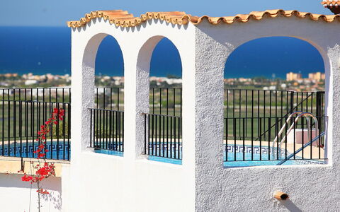 Grand Lusianna: Blue, Arch, Azure, Property, Architecture, Building, Real Estate, Window, House, Facade