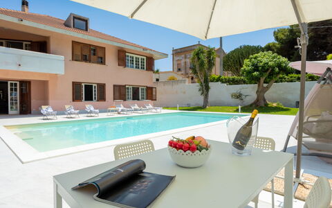 Sammartano: Water, Table, Property, Plant, Building, Furniture, Flower, Window, Swimming Pool, Azure