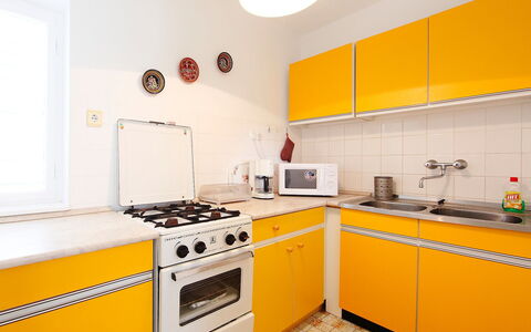 Cyklamen: Room, Kitchen, Yellow, Property, Orange, Cabinetry, Furniture, Interior Design, Countertop, Building