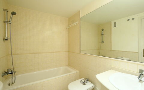 Sidney: Bathroom, Property, Room, Wall, Tile, Plumbing Fixture, Bathtub, Tap, Floor, Interior Design
