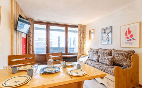 Tignes 290: Table, Furniture, Couch, Picture Frame, Azure, Wood, Interior Design, Window, Orange, Living Room