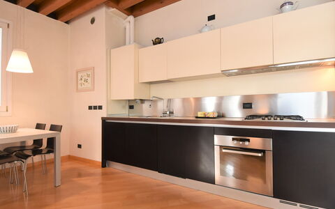 Venezia Giudecca 830: Cabinetry, Countertop, Furniture, Property, Building, Kitchen, Interior Design, House, Wood, Kitchen Stove
