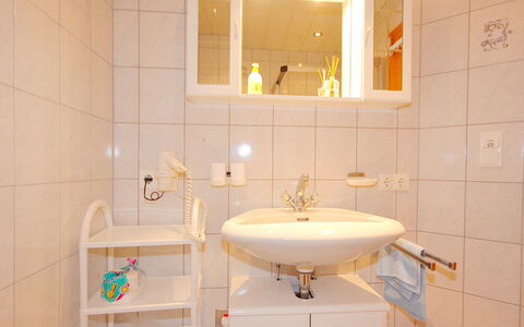 Christian: Bathroom, Property, Room, Tile, Interior Design, Plumbing Fixture, Bathroom Accessory, Tap, Architecture, Floor