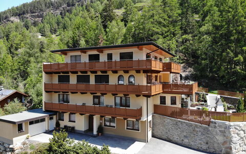 Sölden 100: Plant, Building, Window, Tree, Land Lot, Vegetation, Urban Design, Biome, Sky, Mountain