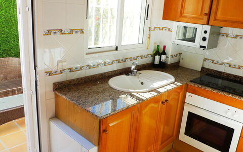 Bella Tierra: Countertop, Room, Sink, Property, Furniture, Cabinetry, Kitchen, Tile, Floor, Bathroom Cabinet