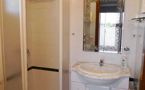 Bella Tierra: Bathroom, Property, Room, Bathroom Accessory, Bathroom Cabinet, Plumbing Fixture, Wall, Tile, Door, Tap