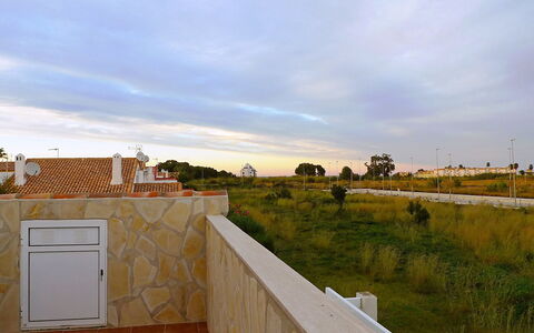 Bella Tierra: Property, Wall, House, Sky, Real Estate, Land Lot, Home, Roof, Residential Area, Grass