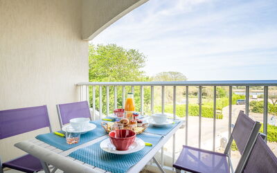 La Grande Motte 690: Furniture, Building, Table, Plant, Chair, Houseplant, Shade, Orange, Interior Design, Flooring