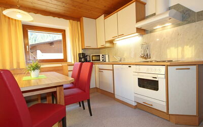 Tschiderer 110.3: Room, Furniture, Property, Cabinetry, Kitchen, Interior Design, Building, Countertop, House, Floor