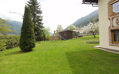 Ferienhaus Kofler: Lawn, Property, Grass, Yard, Land Lot, House, Cottage, Tree, Garden, Grassland